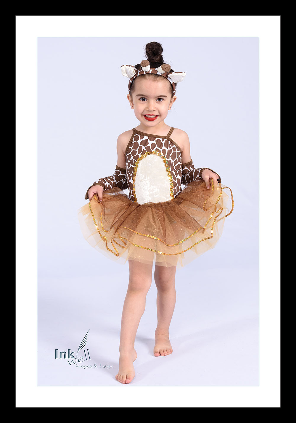 Little girl in a giraffe dance tutu