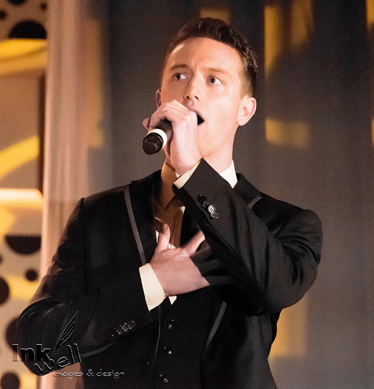 event-promotional, singer at podium